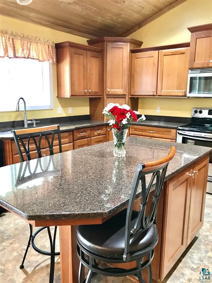 5048 Independence Road Saginaw, MN 55779 - Photo 8 of 34 GRANITE CENTER ISLAND VAULTED T & G ASH CEILINGS