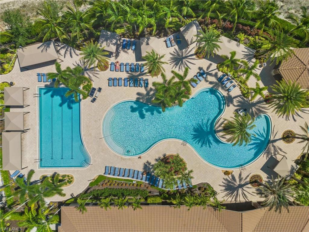 3260 Atlantic Circle Naples, FL 34119 - Photo 44 of 50 an aerial view of a swimming pool
