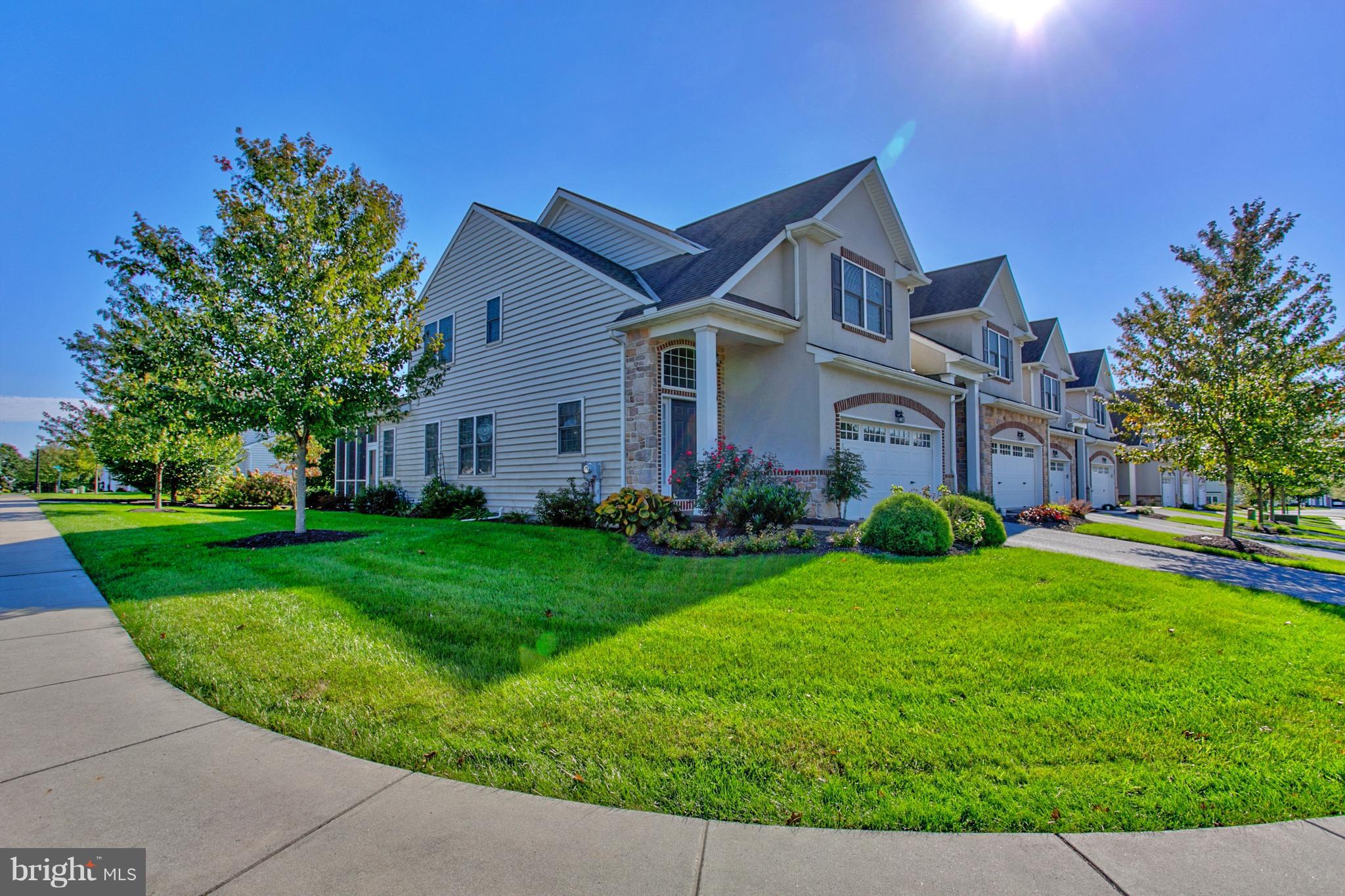 131 Baneberry Lane Lititz, PA 17543 - Photo 1 of 26 a front view of a house with garden