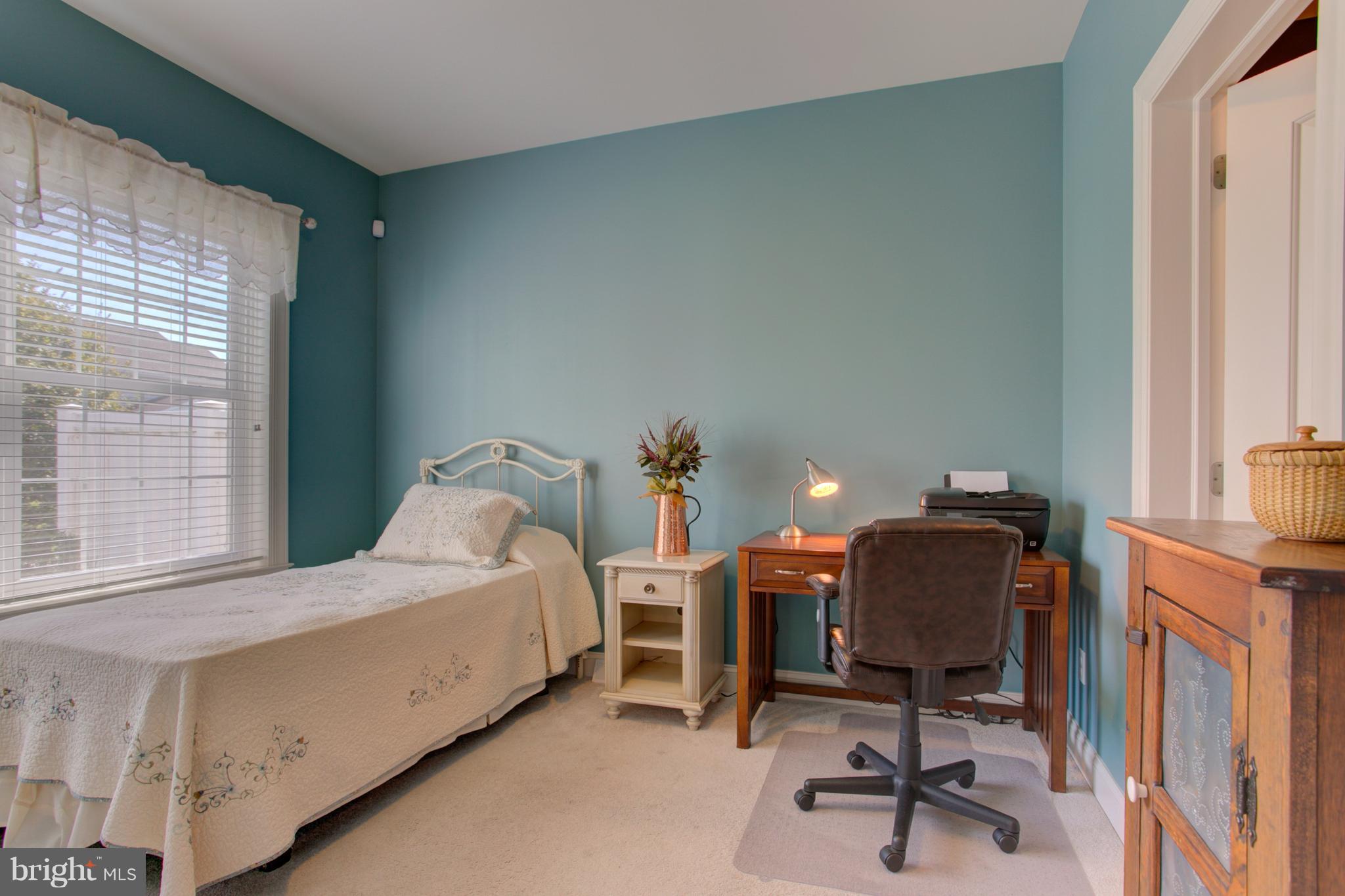 131 Baneberry Lane Lititz, PA 17543 - Photo 11 of 26 a bedroom with a workspace