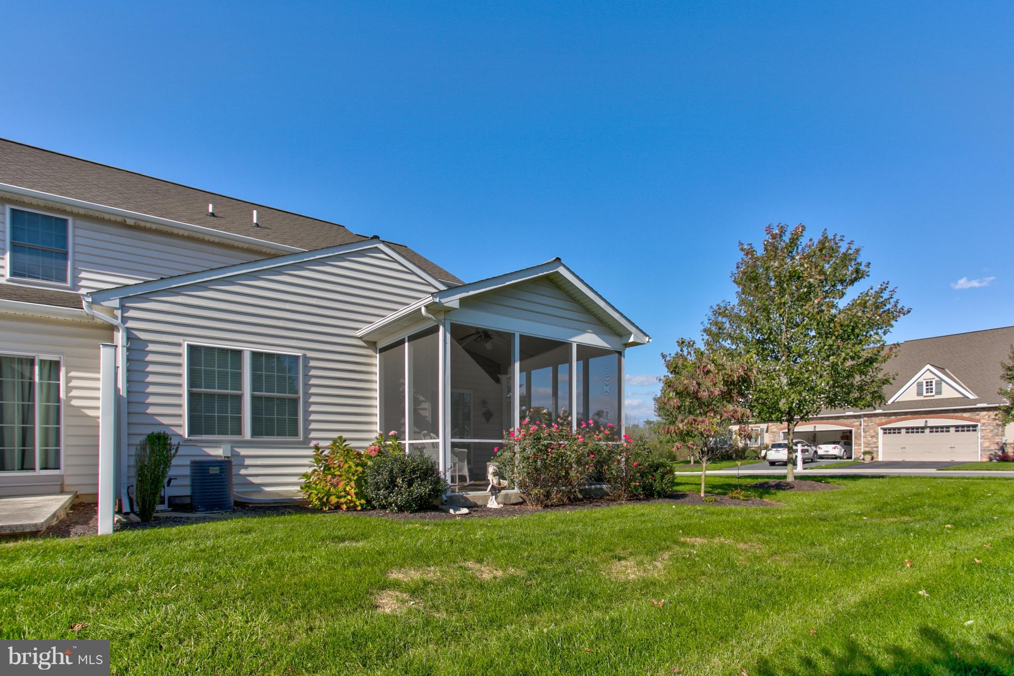 131 Baneberry Lane Lititz, PA 17543 - Photo 25 of 26 a view of a house with a big yard potted plants and large trees