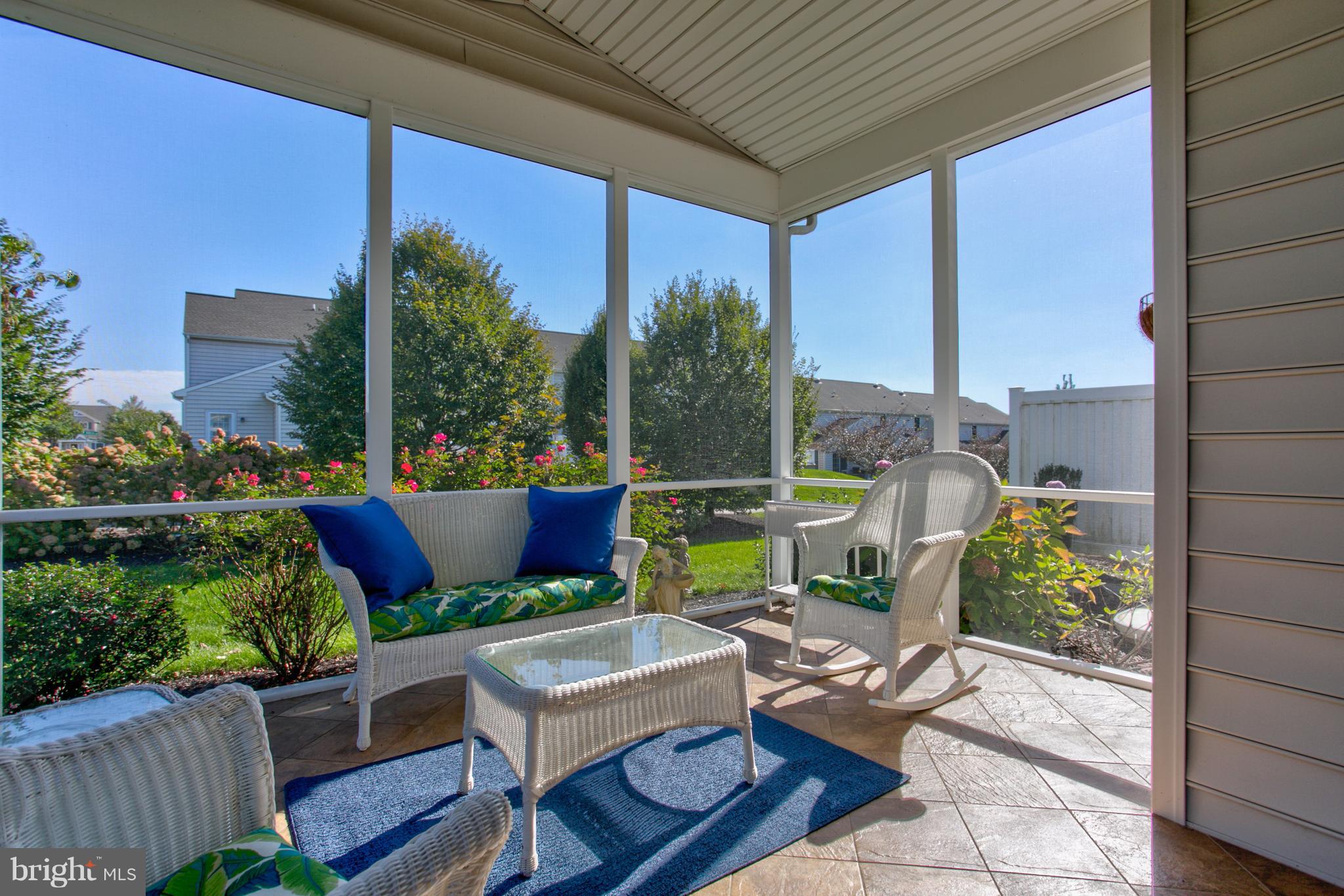 131 Baneberry Lane Lititz, PA 17543 - Photo 4 of 26 a building outdoor space with patio furniture and potted plants