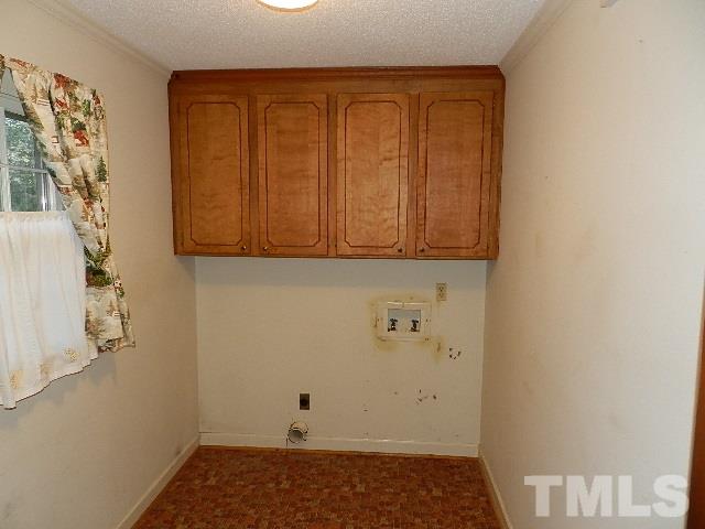 7209 Battle Bridge Road Raleigh, NC 27610 - Photo 8 of 21 a view of utility room