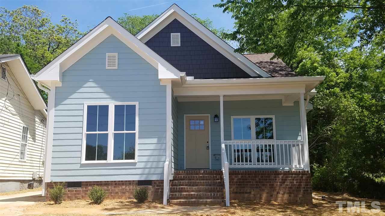 1433 Garner Road Raleigh, NC 27610 - Photo 2 of 23 a view of a house with a yard