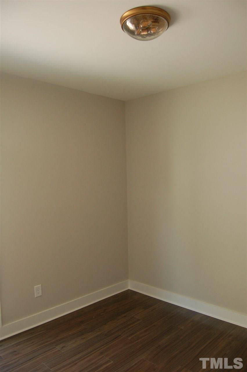 1433 Garner Road Raleigh, NC 27610 - Photo 9 of 23 a view of a small space with wooden floor