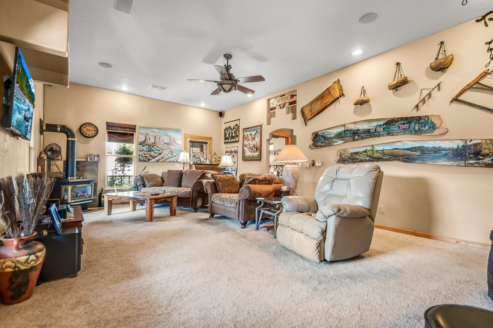 962-17 17 1/4 Road Fruita, CO 81521 - Photo 12 of 37 a living room with furniture and a flat screen tv