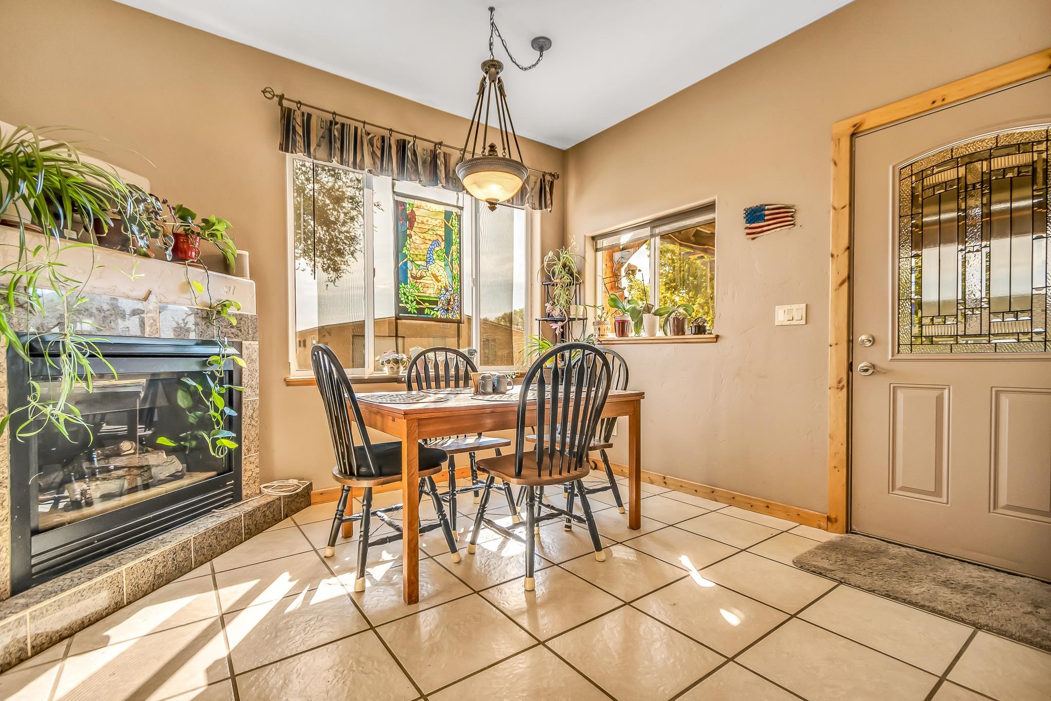 962-17 17 1/4 Road Fruita, CO 81521 - Photo 16 of 37 a dining room with furniture and window