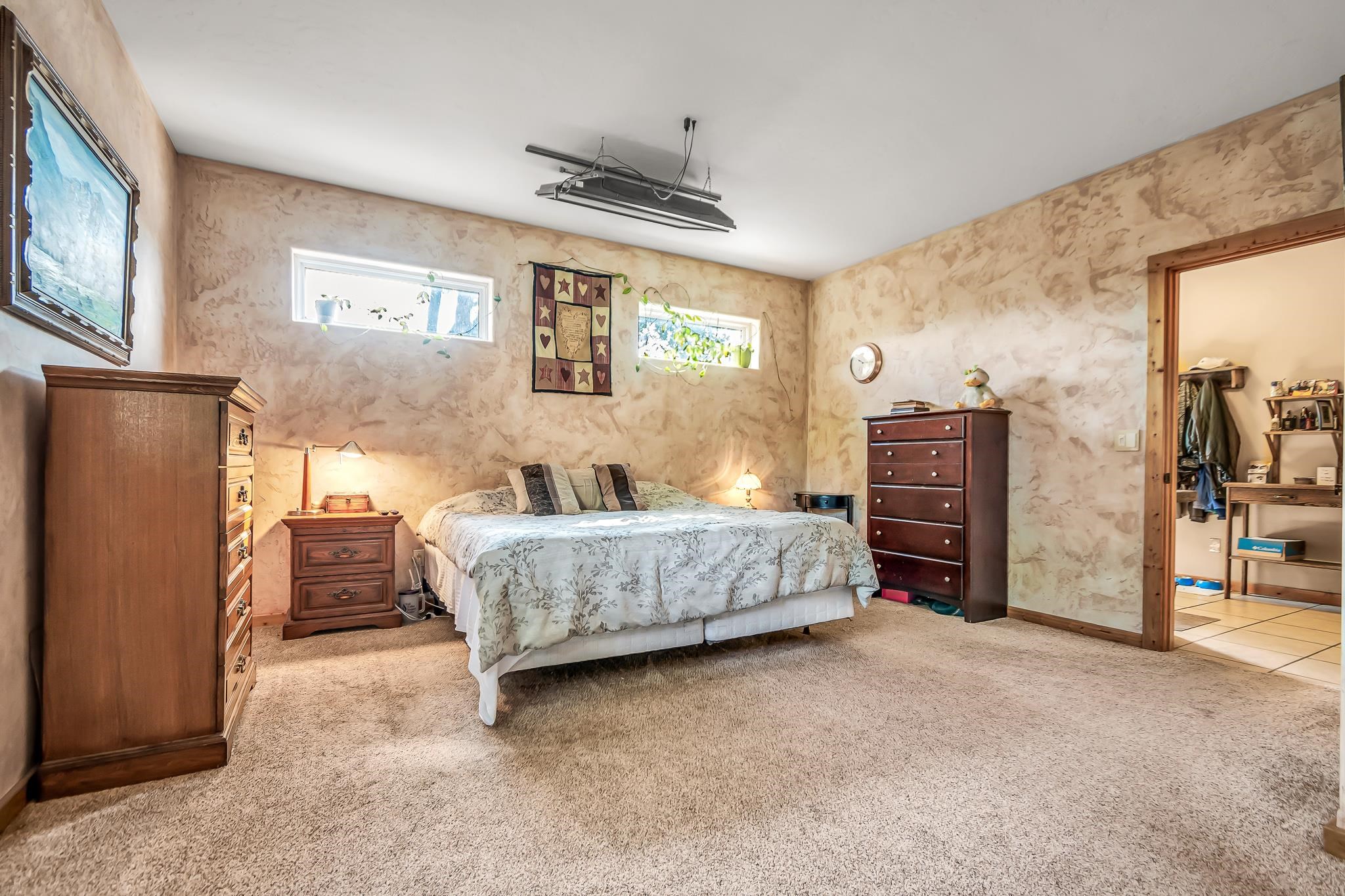 962-17 17 1/4 Road Fruita, CO 81521 - Photo 17 of 37 a bedroom with bed and a window