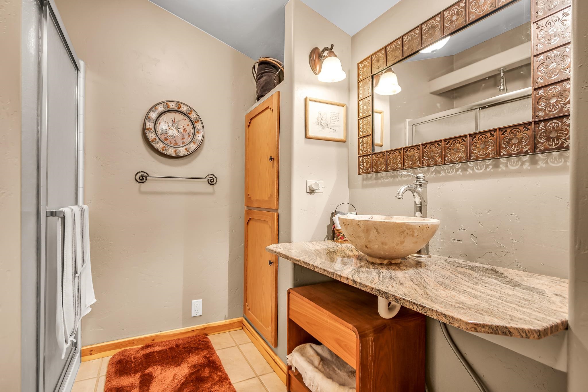 962-17 17 1/4 Road Fruita, CO 81521 - Photo 20 of 37 a bathroom with a sink and a mirror