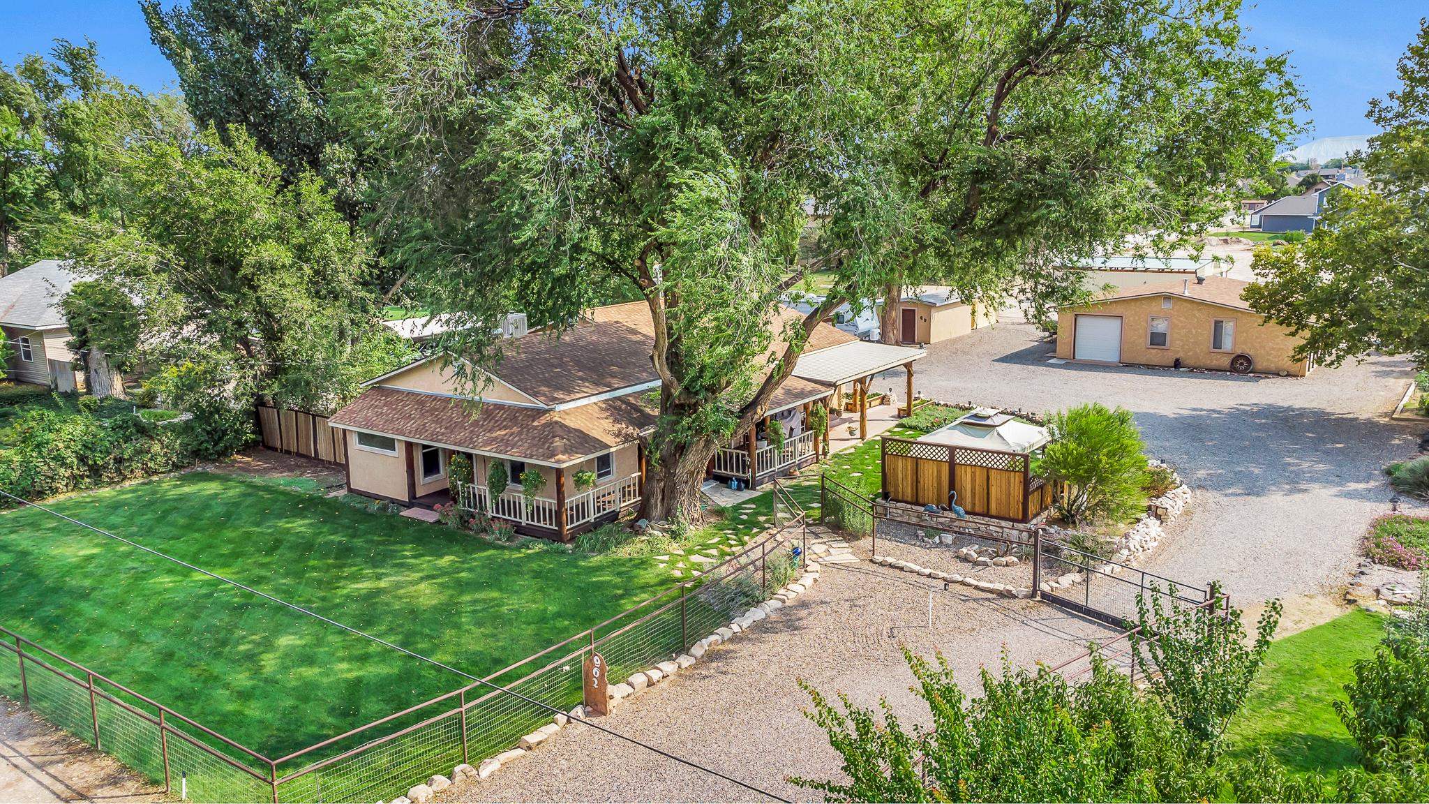 962-17 17 1/4 Road Fruita, CO 81521 - Photo 25 of 37 an aerial view of a house with garden space and sitting area