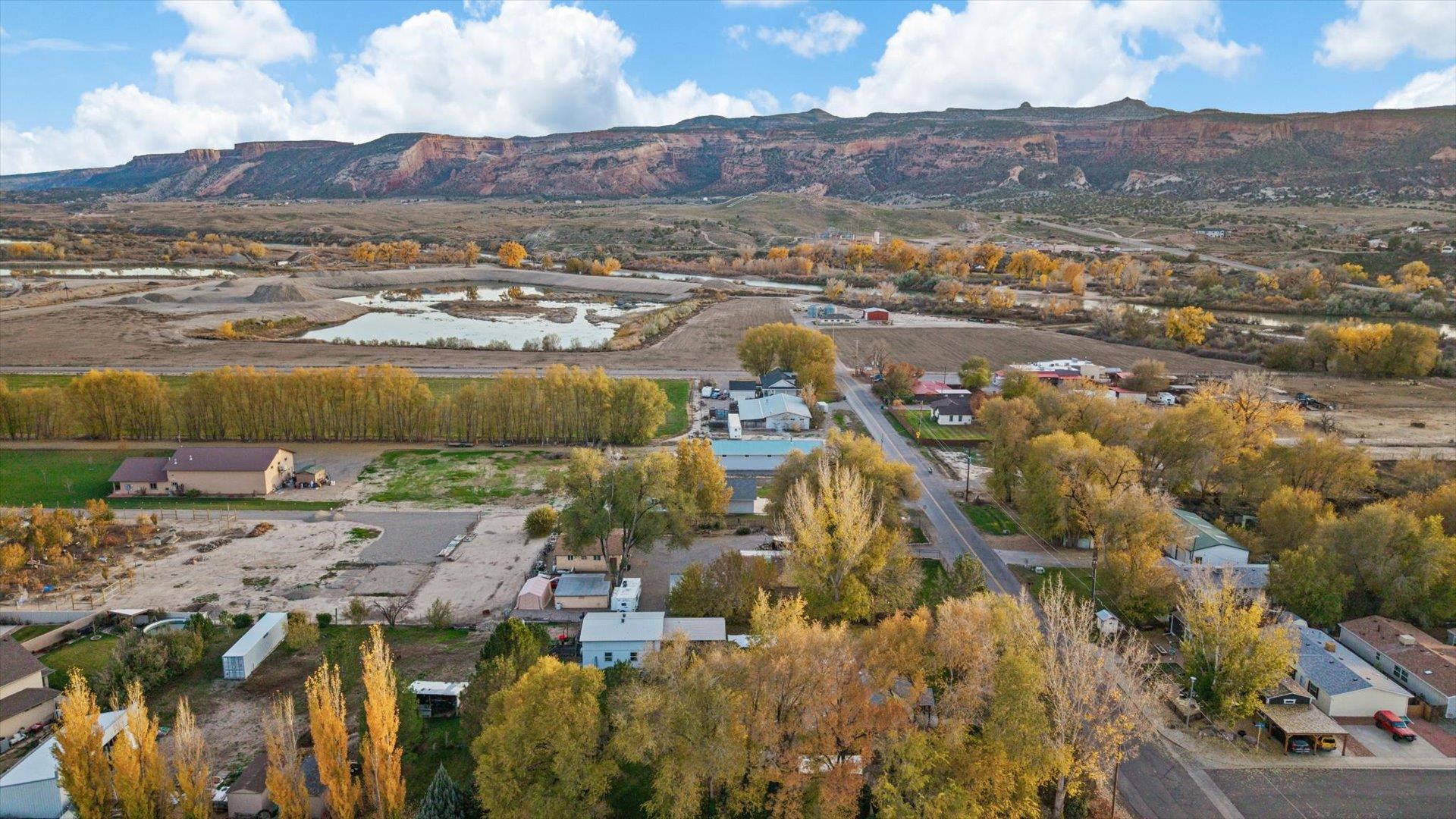 962-17 17 1/4 Road Fruita, CO 81521 - Photo 29 of 37 an aerial view of residential building and lake