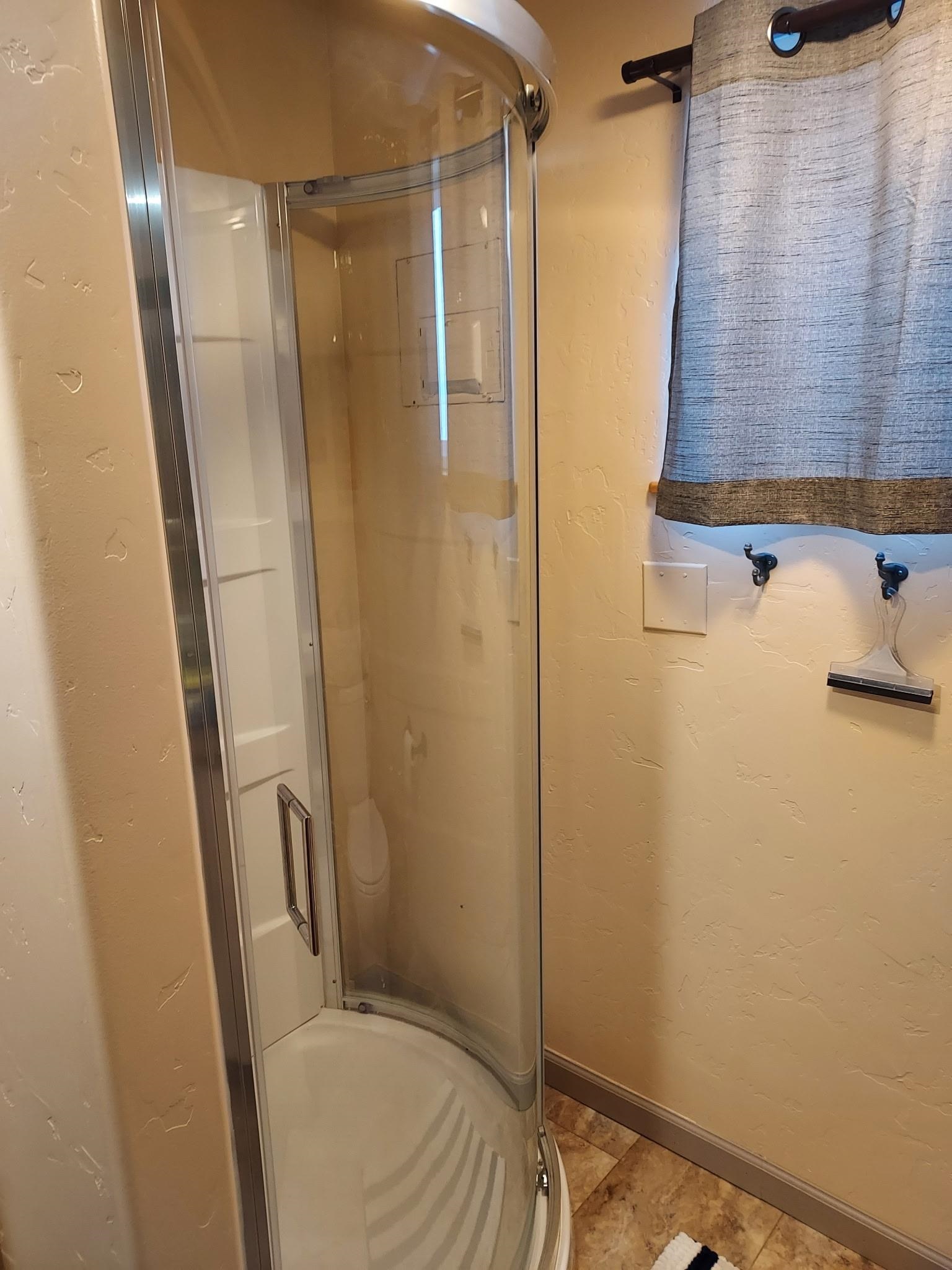 962-17 17 1/4 Road Fruita, CO 81521 - Photo 37 of 37 a bathroom with a shower and a toilet