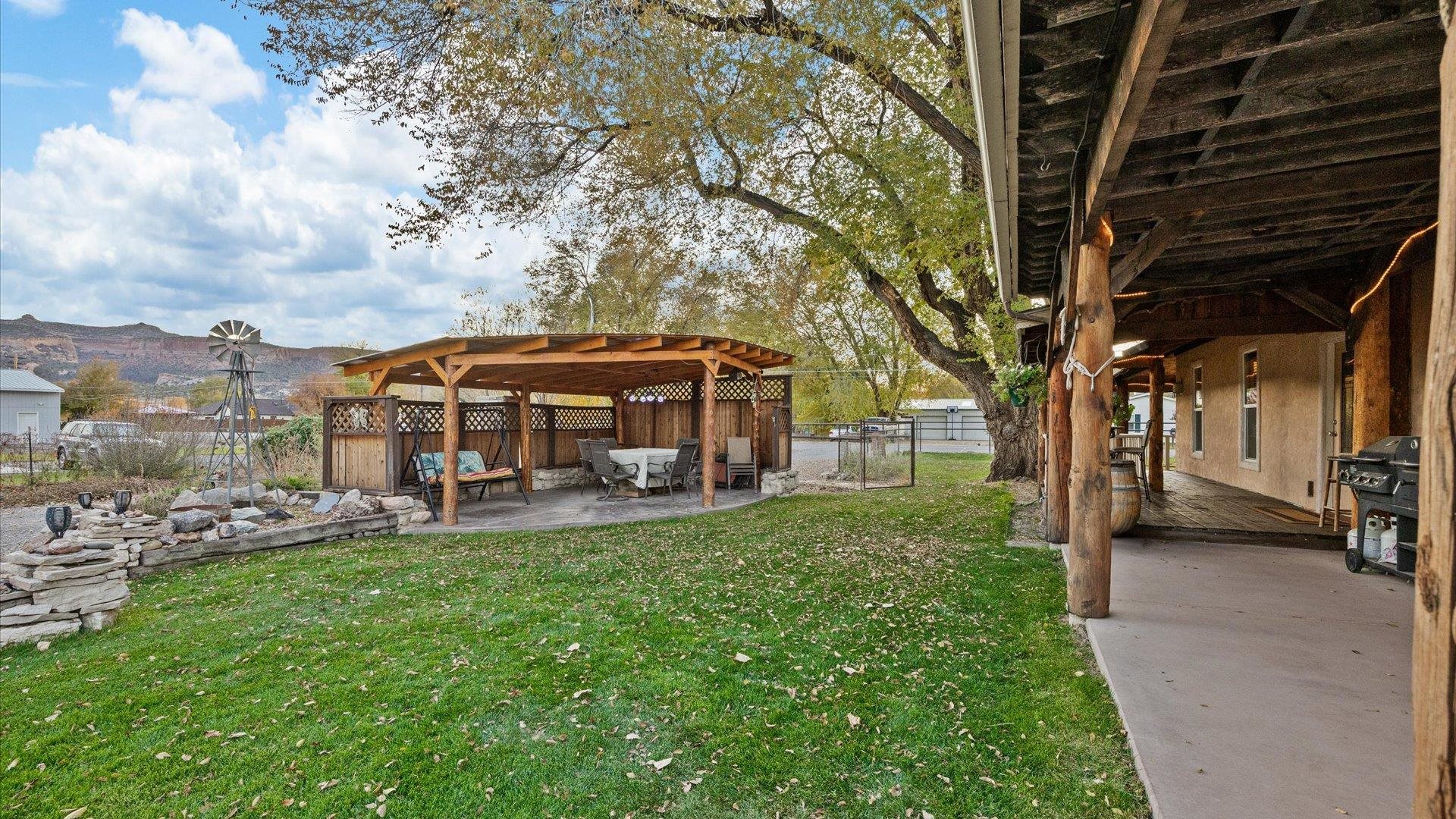 962-17 17 1/4 Road Fruita, CO 81521 - Photo 8 of 37 a view of a house with backyard porch and sitting area