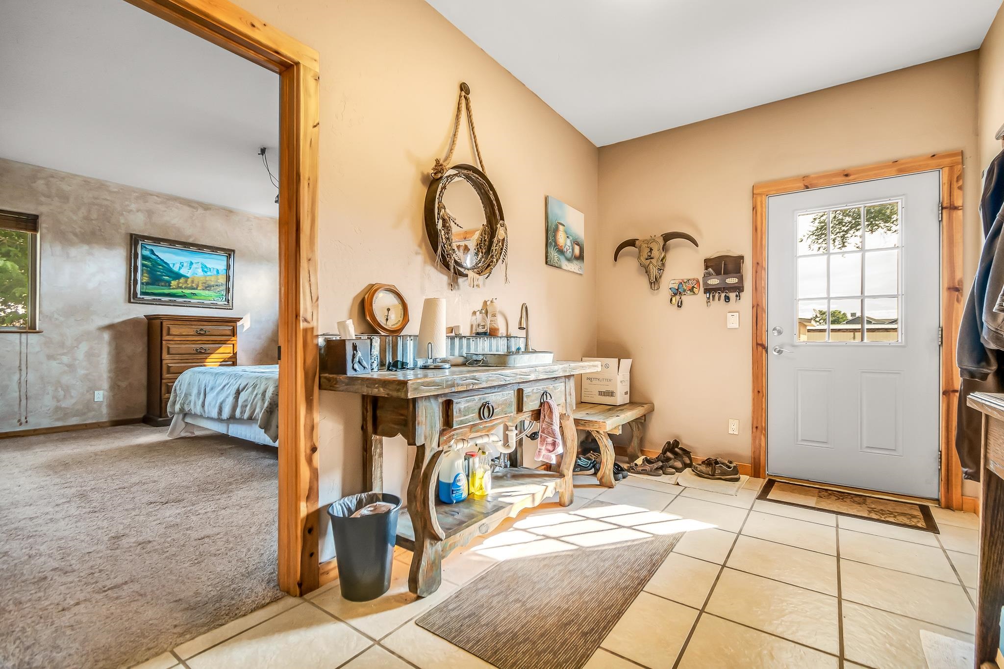962-17 17 1/4 Road Fruita, CO 81521 - Photo 9 of 37 a view of a livingroom with furniture and front door