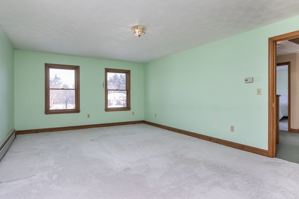 10 Ryan Road Townsend, MA 01474 - Photo 13 of 34 an empty room with windows