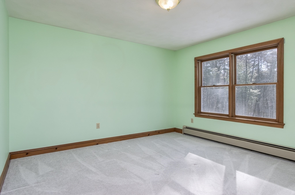 10 Ryan Road Townsend, MA 01474 - Photo 16 of 34 an empty room with a window