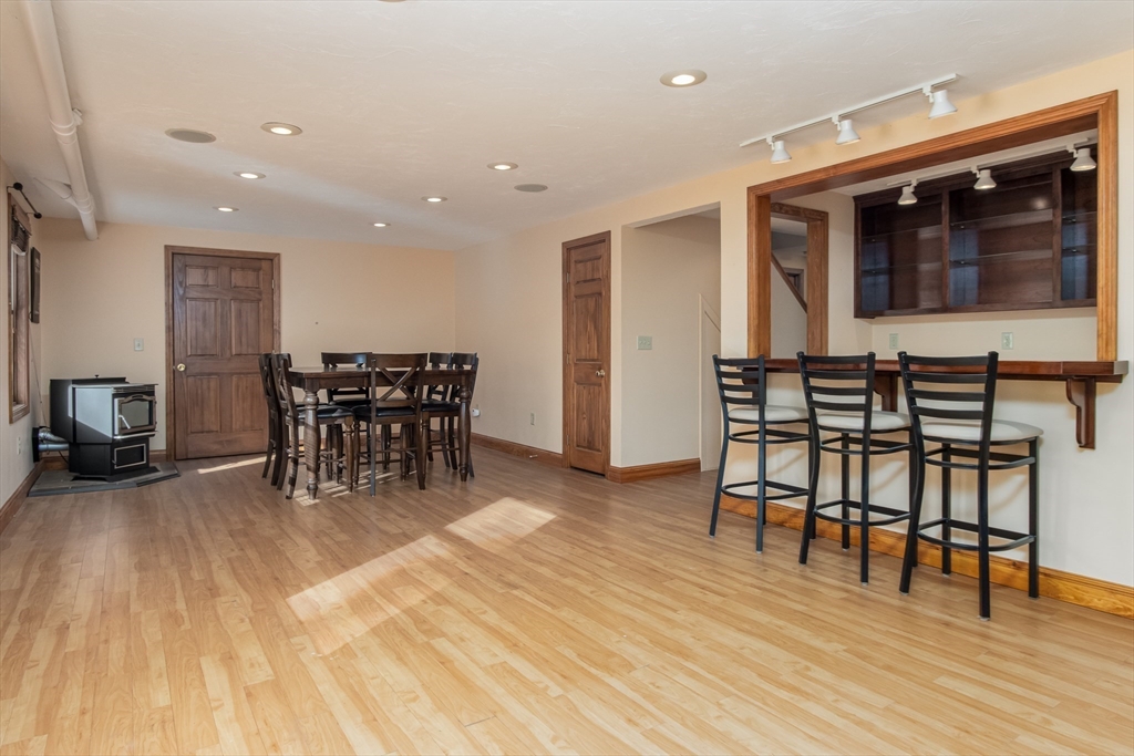 10 Ryan Road Townsend, MA 01474 - Photo 21 of 34 a view of a dining room with furniture and wooden floor