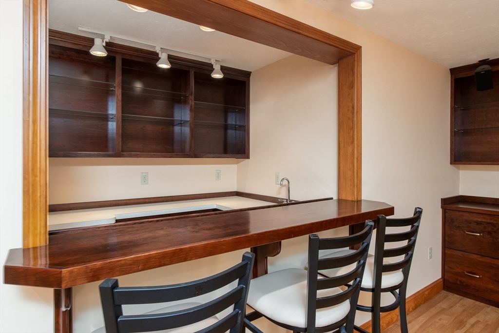 10 Ryan Road Townsend, MA 01474 - Photo 23 of 34 a room with a table and chairs