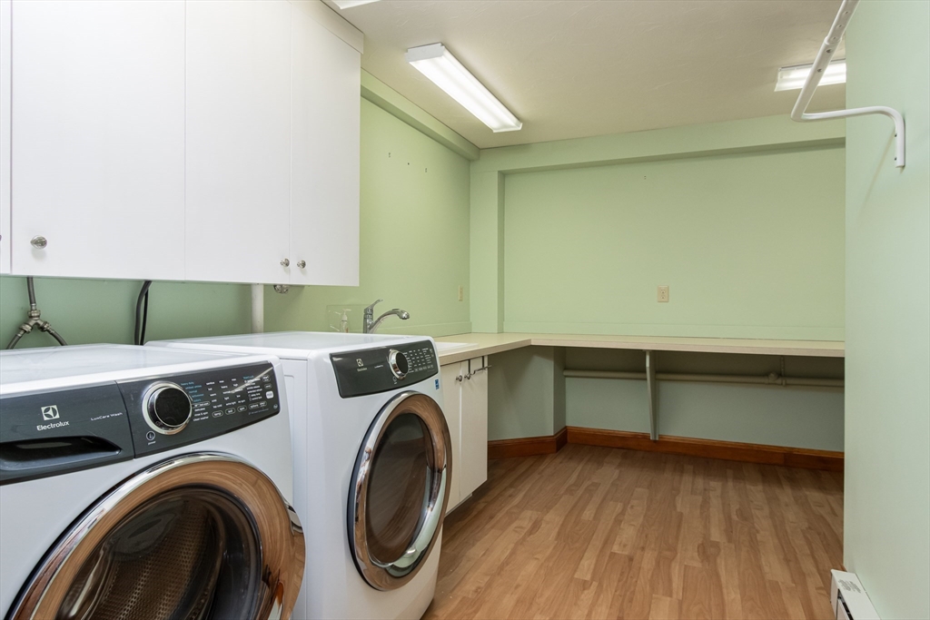 10 Ryan Road Townsend, MA 01474 - Photo 24 of 34 a utility room with dryer and washer