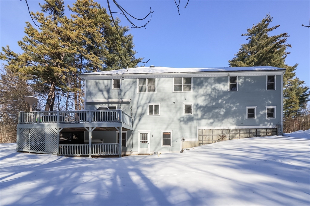 10 Ryan Road Townsend, MA 01474 - Photo 28 of 34 a view of a building with a yard