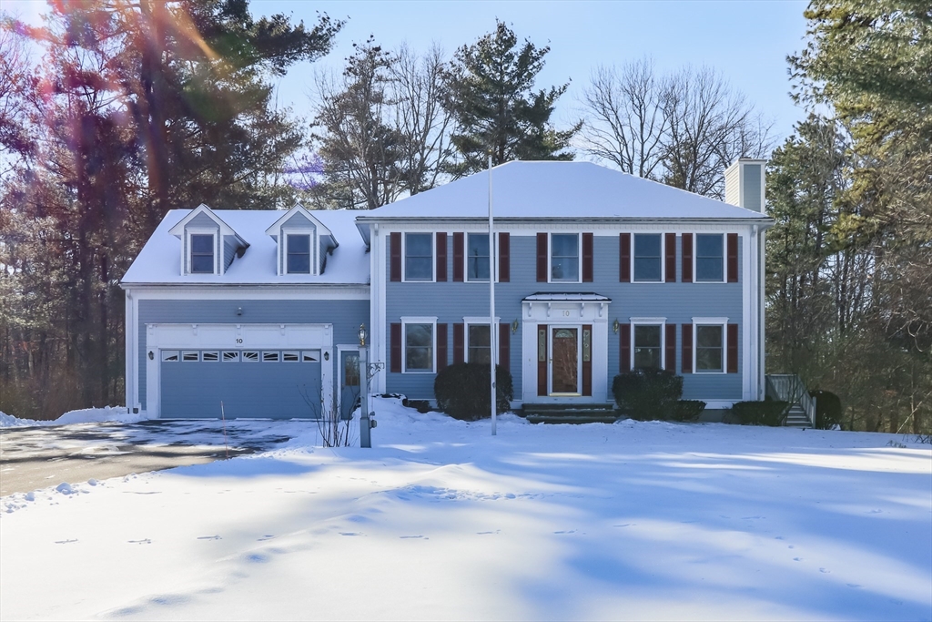 10 Ryan Road Townsend, MA 01474 - Photo 29 of 34 a front view of a house with a garden