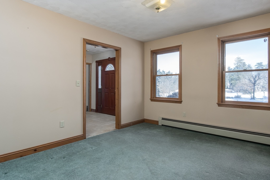 10 Ryan Road Townsend, MA 01474 - Photo 10 of 34 an empty room with windows and closet