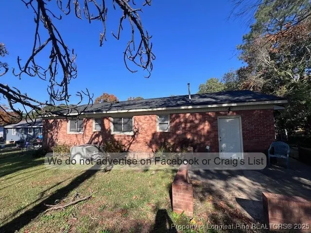a view of a yard with an outdoor space