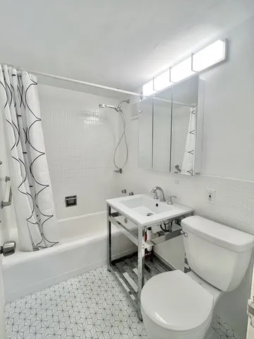 a bathroom with a sink and a toilet