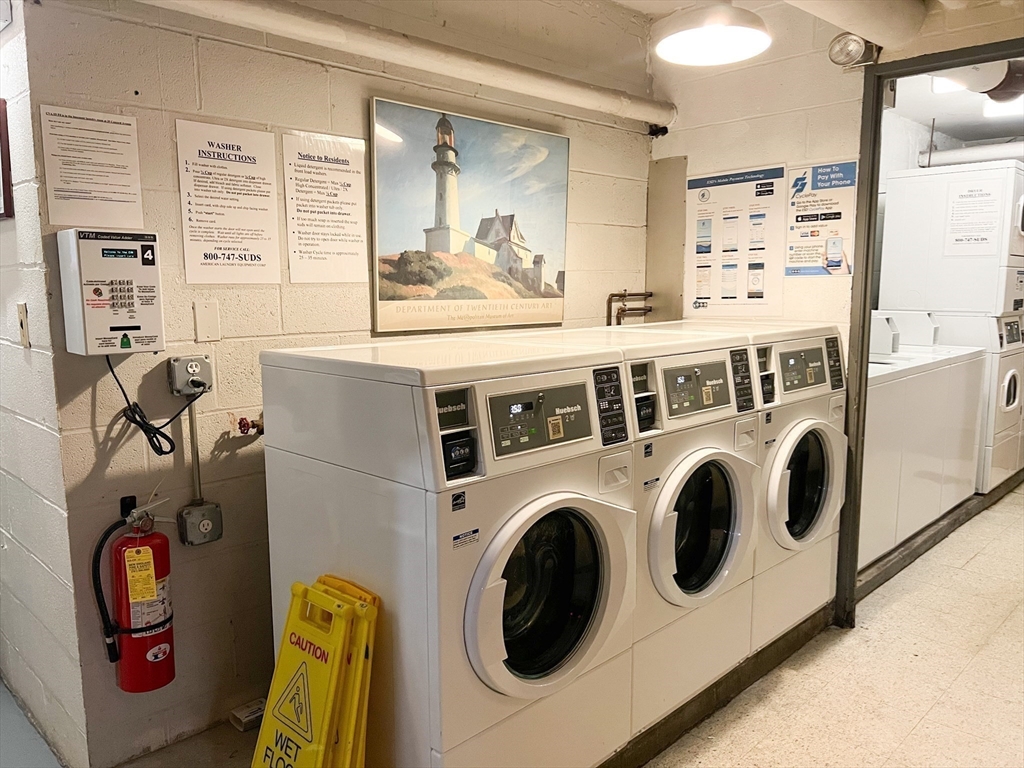 29 Concord Avenue, Unit 405 Cambridge, MA 02138 - Photo 9 of 12 a utility room with dryer and washer