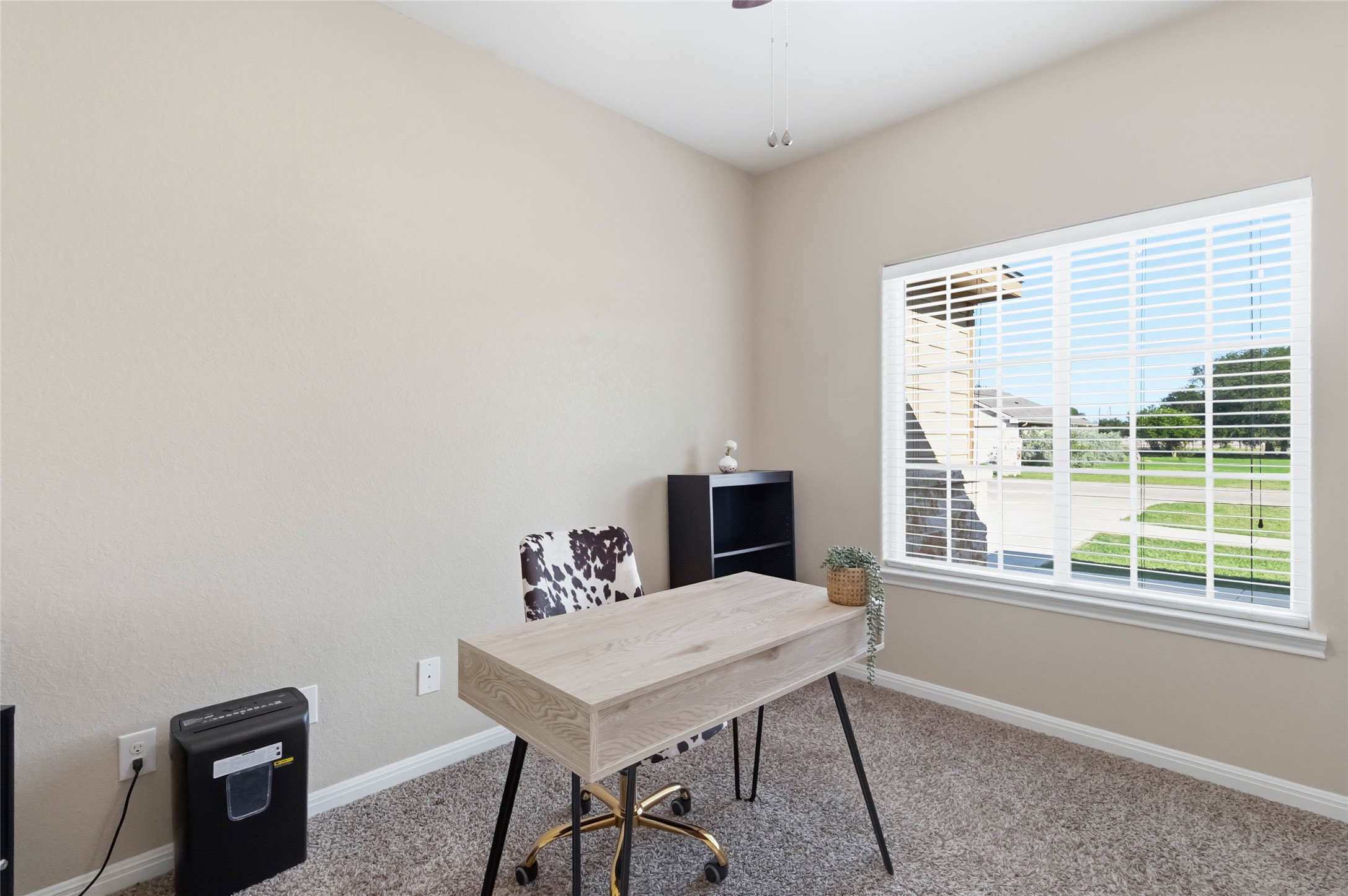 285 Hummingbird Way Martindale, TX 78655 - Photo 30 of 40 a view of a room with a table and chairs
