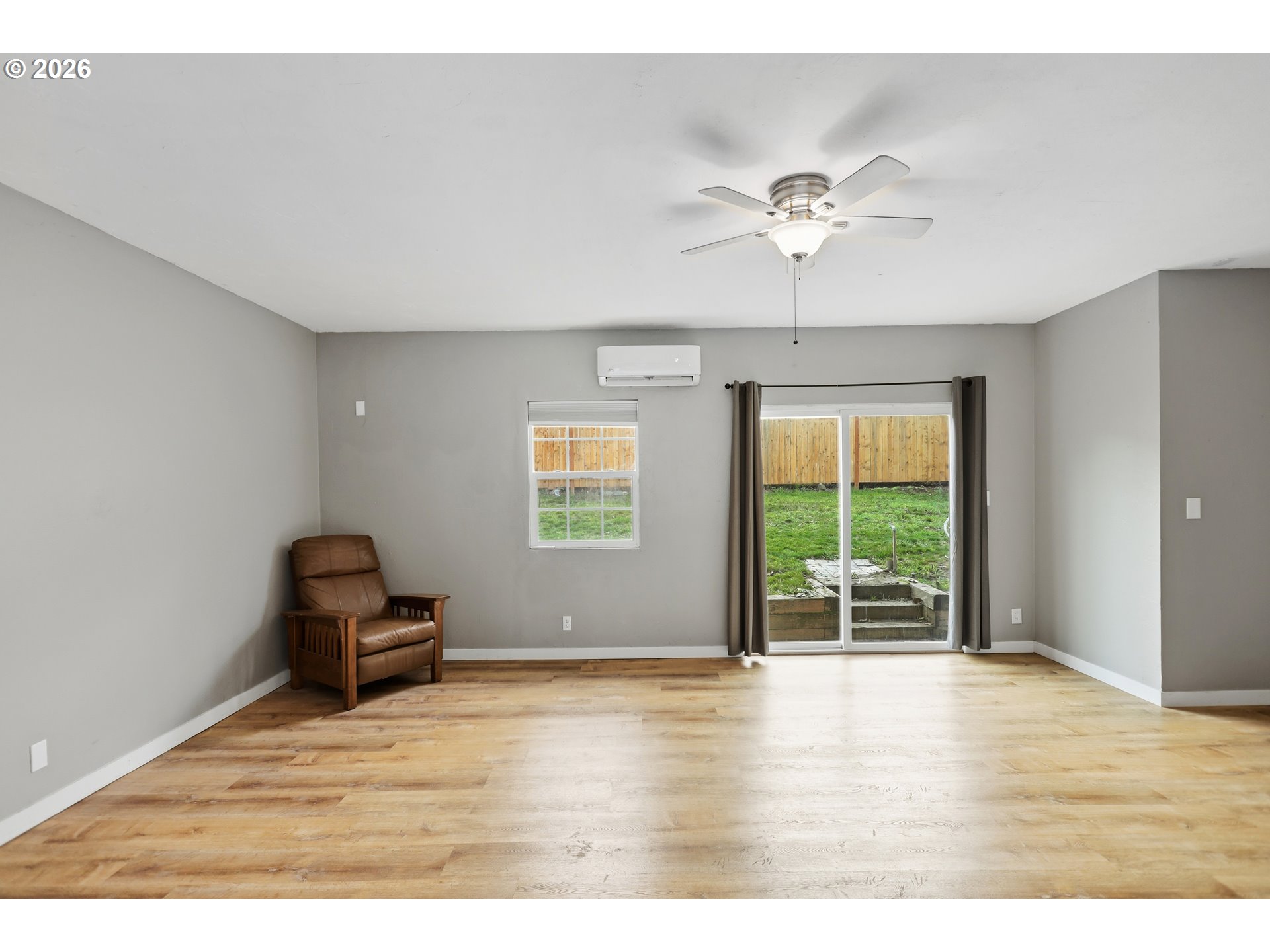 2306 West 13th Street The Dalles, OR 97058 - Photo 16 of 32 a view of an empty room with a window