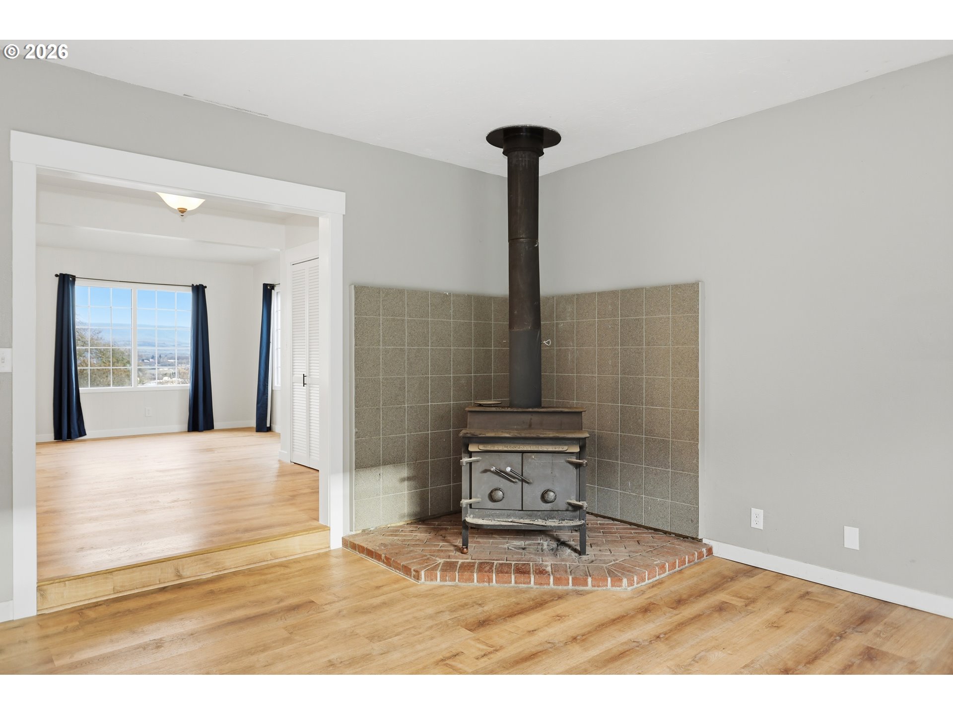 2306 West 13th Street The Dalles, OR 97058 - Photo 17 of 32 a bathroom with a sink and a mirror
