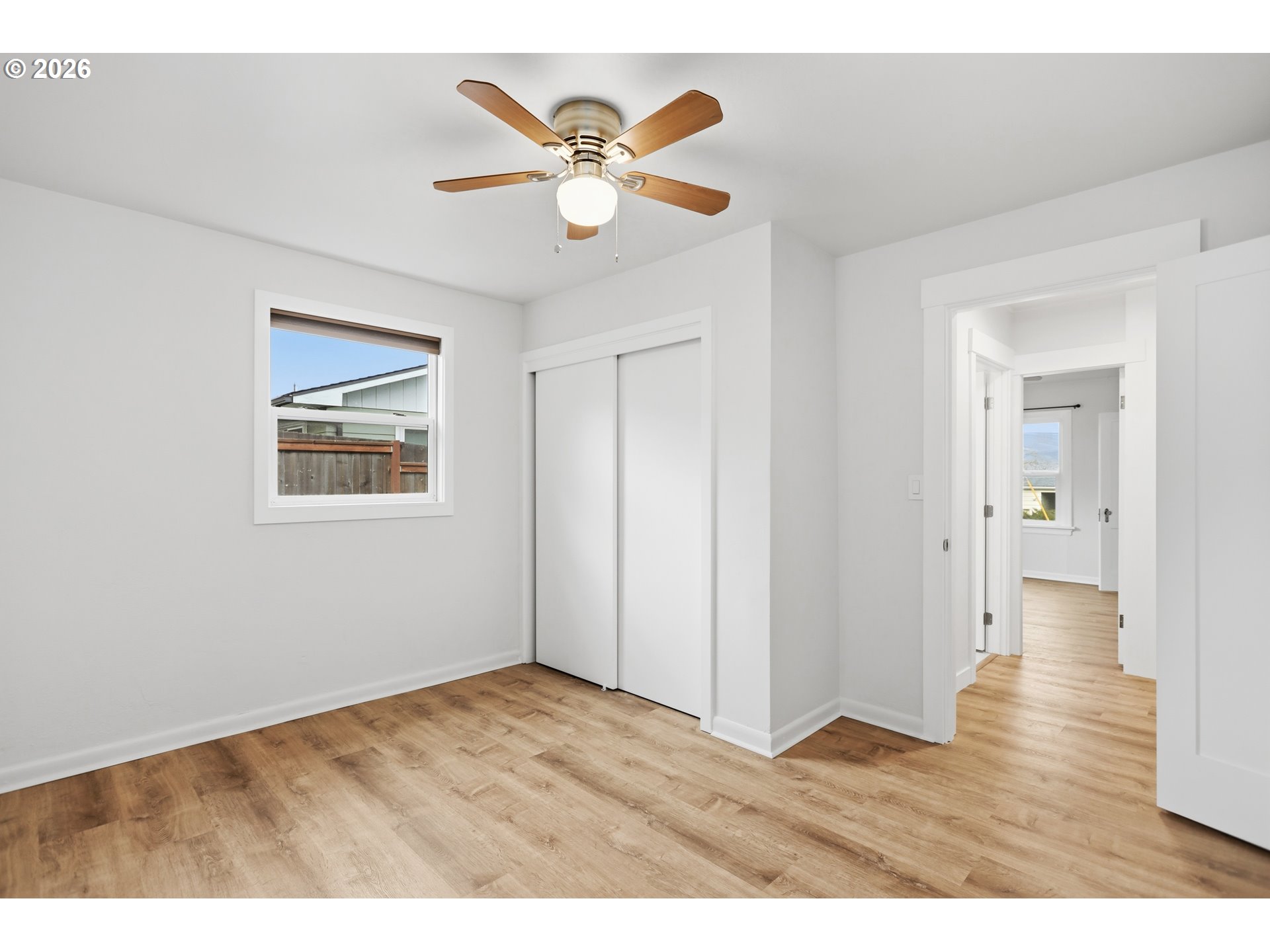 2306 West 13th Street The Dalles, OR 97058 - Photo 22 of 32 a view of an empty room with wooden floor