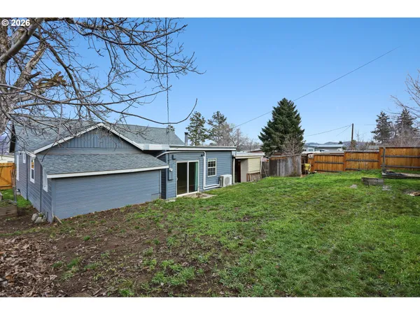 a house view with a garden space