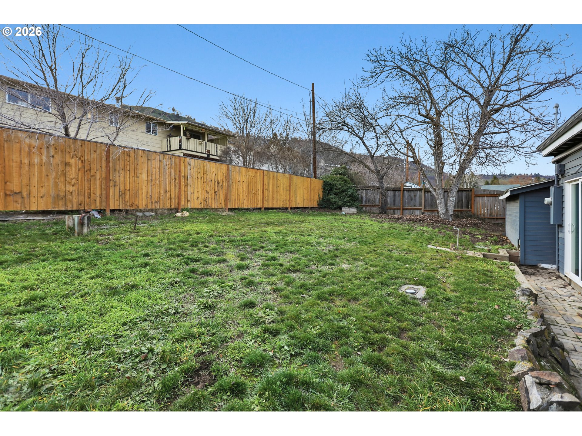 2306 West 13th Street The Dalles, OR 97058 - Photo 28 of 32 a view of a backyard of the house