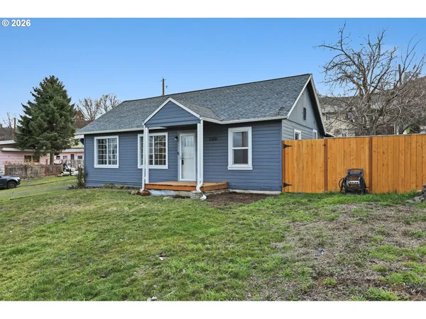 a house view with a garden space