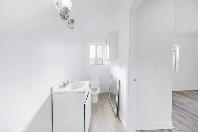 a bathroom with a sink and a toilet