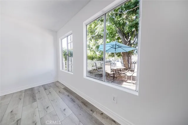 a view of a room with a large window