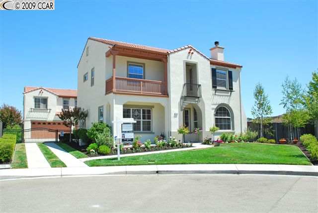 908 Regalo Way San Ramon, CA 94583 - Photo 1 of 1 a view of a brick house with a yard plants and large trees