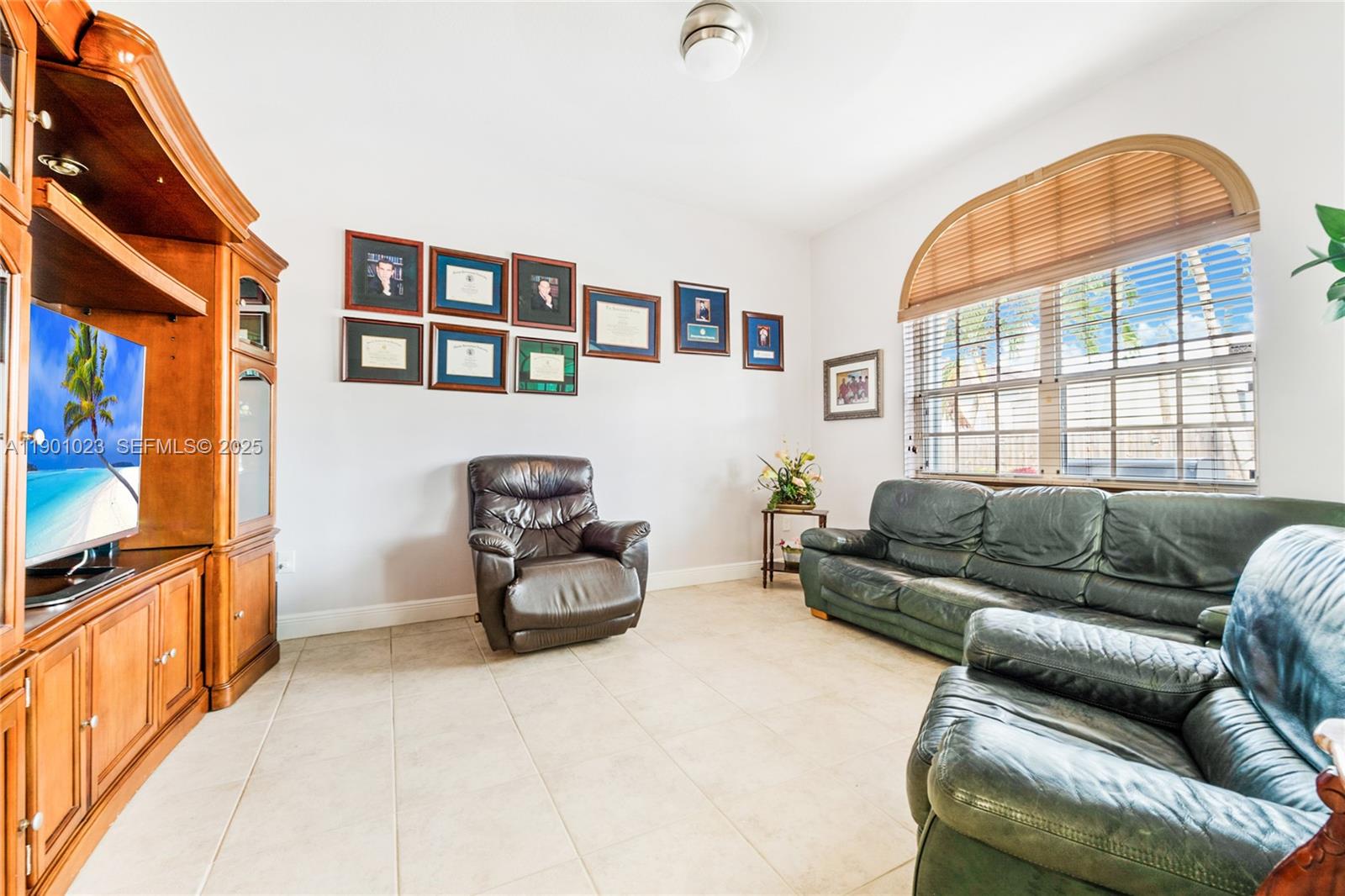 3743 Southwest 133rd Place Miami, FL 33175 - Photo 12 of 26 a living room with furniture and a window