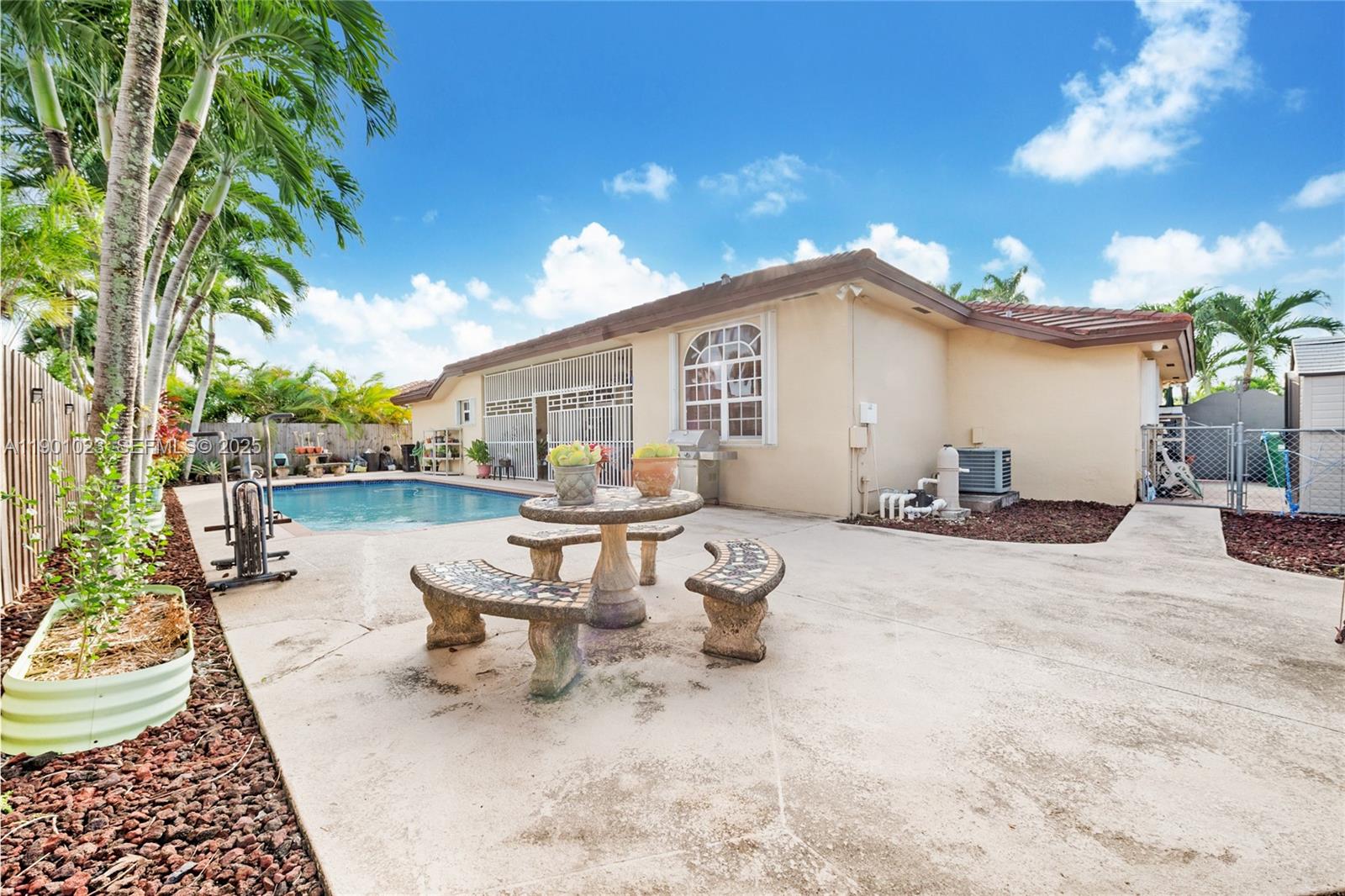 3743 Southwest 133rd Place Miami, FL 33175 - Photo 23 of 26 a view of a backyard with sitting area