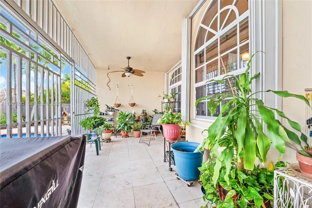 a view of a potted plants on a balcony