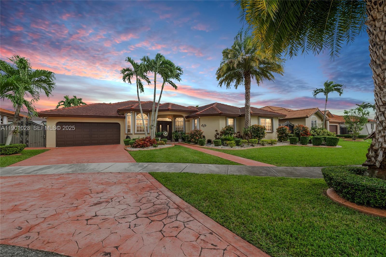 3743 Southwest 133rd Place Miami, FL 33175 - Photo 26 of 26 a front view of house with yard and green space