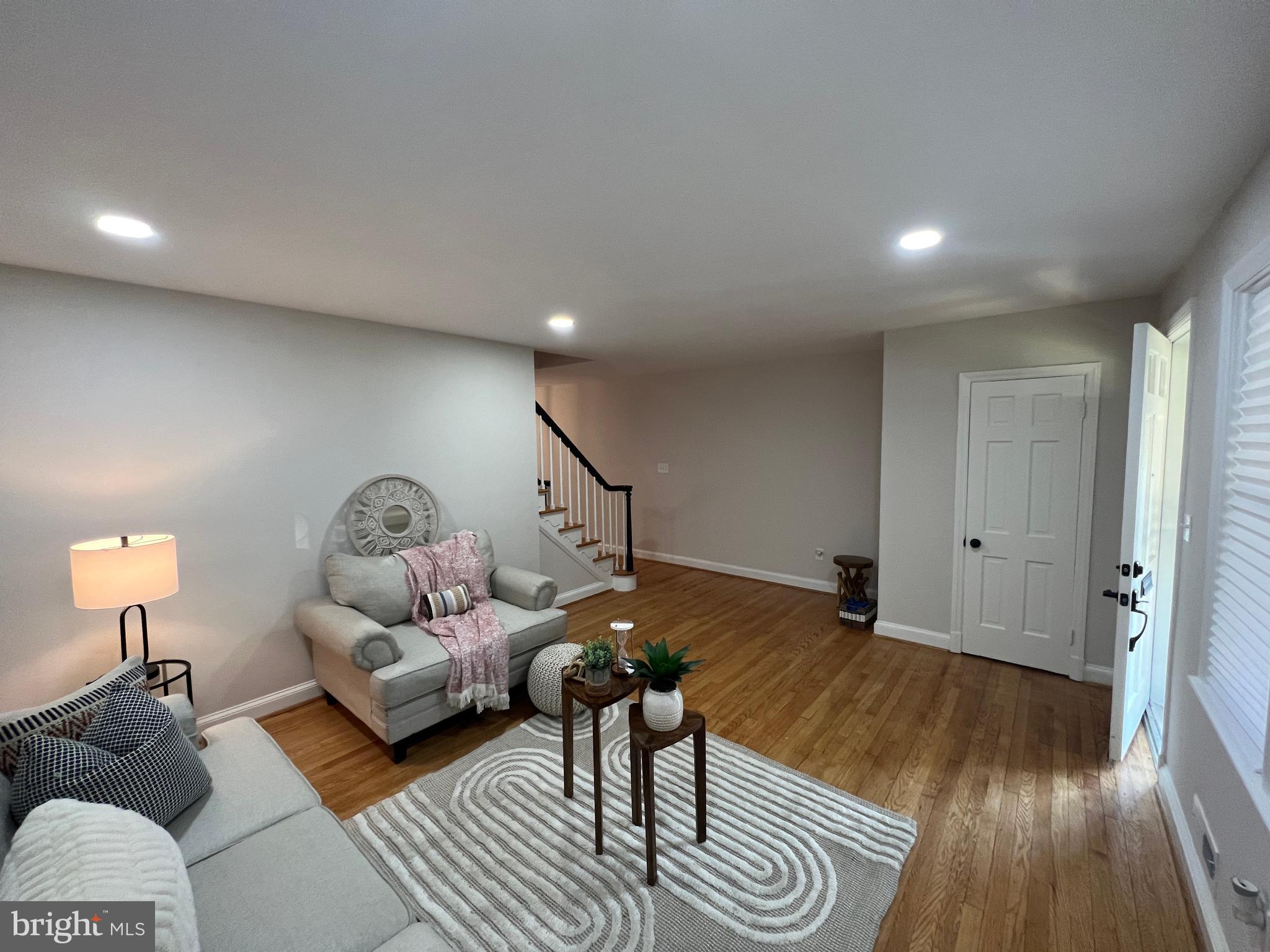 1655 Winford Road Baltimore, MD 21239 - Photo 3 of 44 a living room with furniture and wooden floor