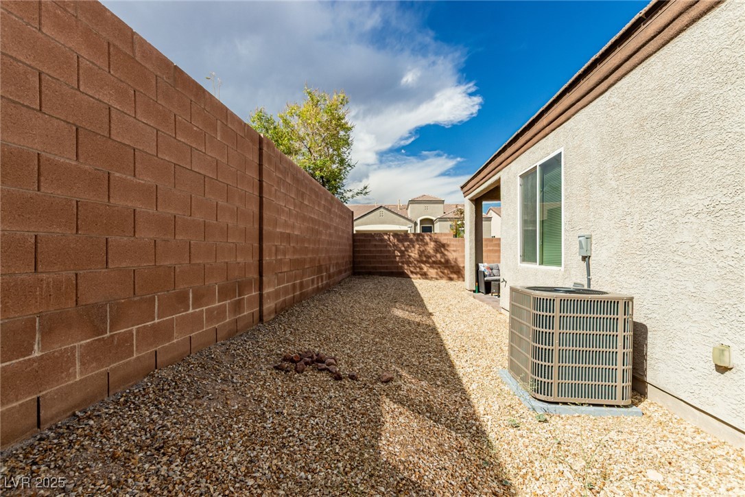 6125 Powdermill Street Las Vegas, NV 89148 - Photo 26 of 33 View of fenced backyard