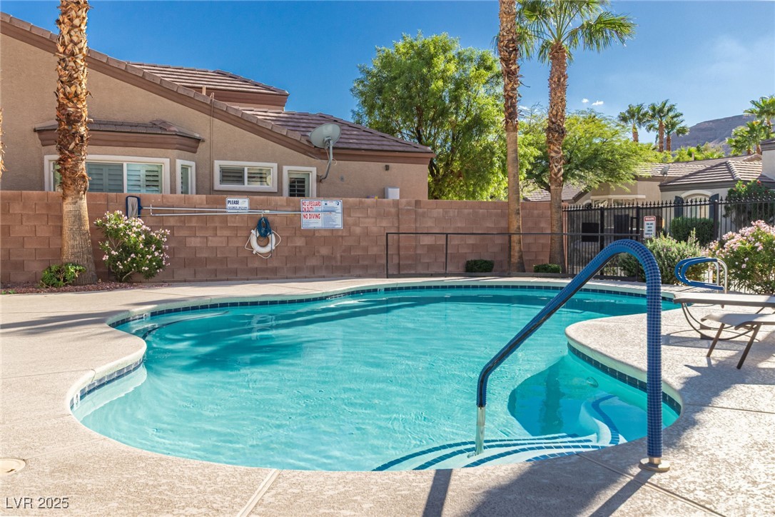 6125 Powdermill Street Las Vegas, NV 89148 - Photo 30 of 33 Community pool with a patio area