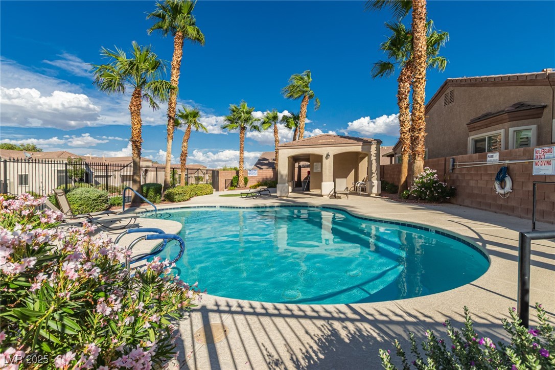 6125 Powdermill Street Las Vegas, NV 89148 - Photo 31 of 33 Community pool featuring a patio area and a residential view