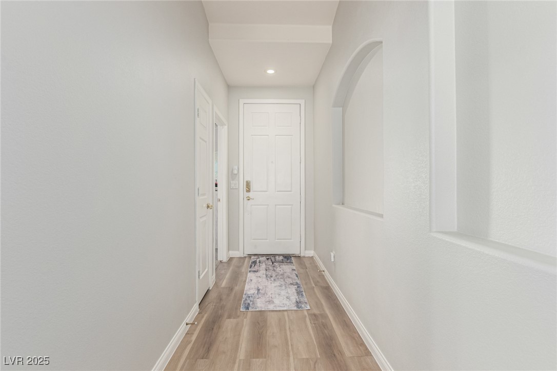 6125 Powdermill Street Las Vegas, NV 89148 - Photo 5 of 33 Corridor with wood finished floors and recessed lighting