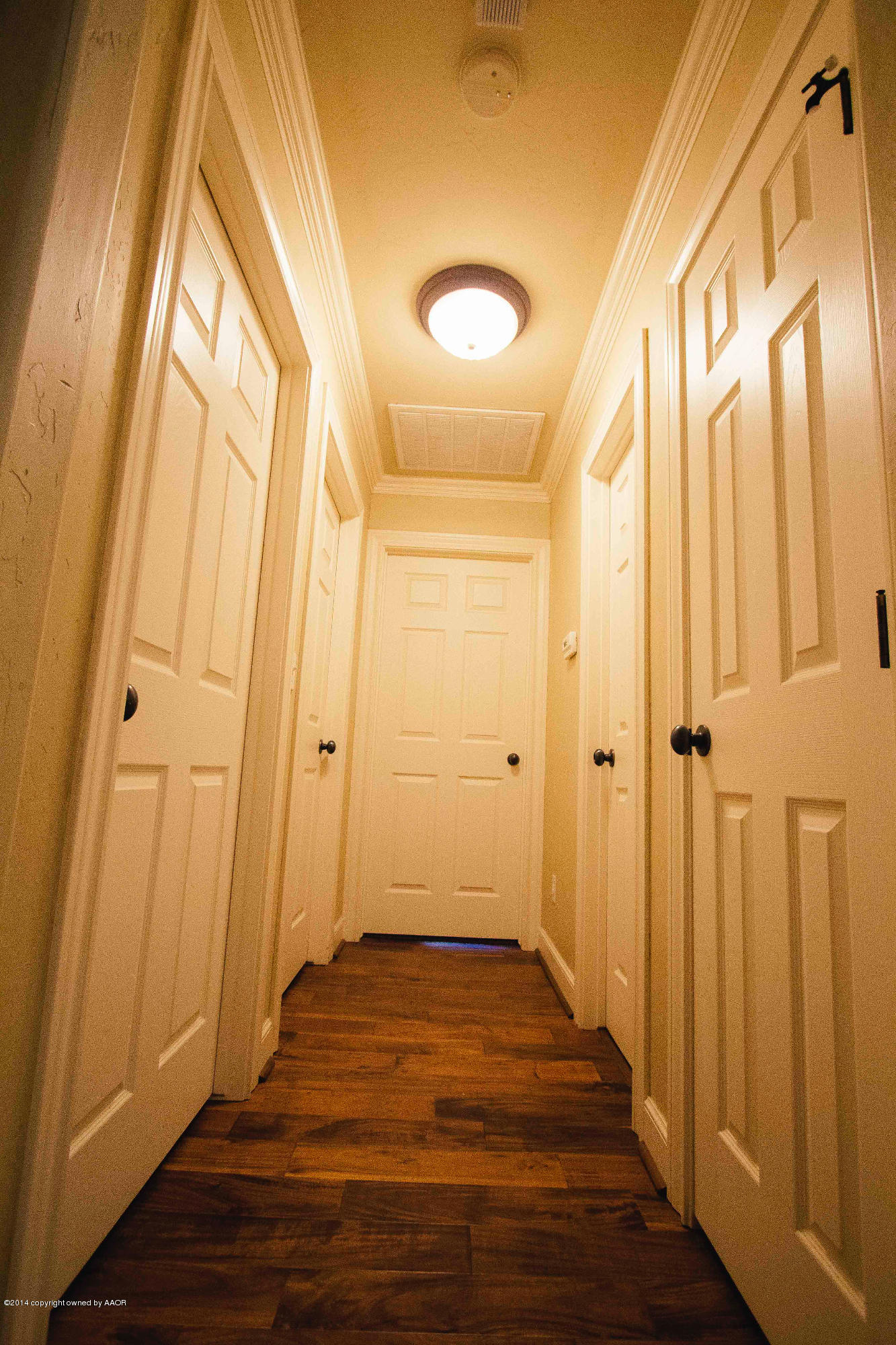 4802 Wesley Road Amarillo, TX 79119 - Photo 14 of 30 Hallway leading to three bedrooms & bath