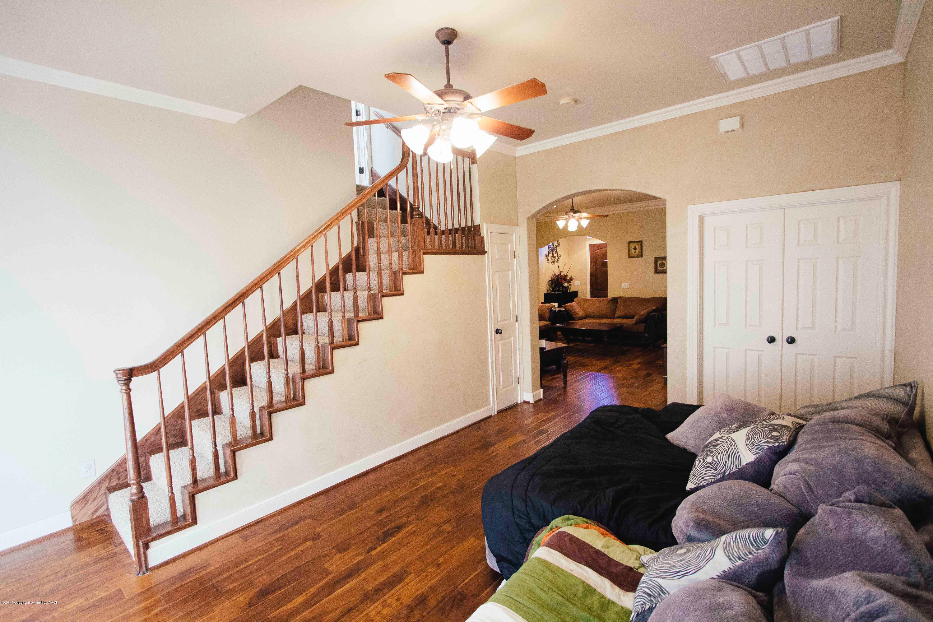 4802 Wesley Road Amarillo, TX 79119 - Photo 25 of 30 Livingroom 2 and staircase to bonus room